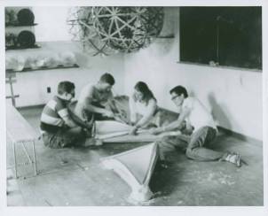 Buckminster Fuller's Architecture class, 1949 Summer Institute, Black Mountain College. Note on the back of the photo states: "Architecture, construction of molds for precast forms for domes." Left to right: unidentified student, Eugene Godfrey, Mary Jo Slick, unidentified student. Courtesy North Carolina Museum of Art. Western Regional Archives.