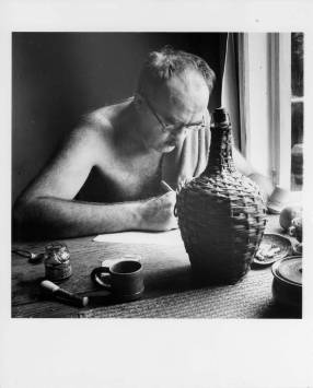 Charles Olson writing at Black Mountain College. Portrait taken by Jonathan Williams of Charles Olson writing at Black Mountain College. Charles Olson taught Writing and Literature at Black Mountain College 1948-1949, 1951, 1953-1956 and in 1953 was appointed the college's Rector.