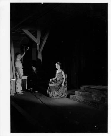 Jane Robinson on stage with stage director George Randall (at left), getting ready for a performance of "The Cherry Orchard" by Anton Chekhov at Black Mountain College, Spring 1941. Courtesy of Western Regional Archives.