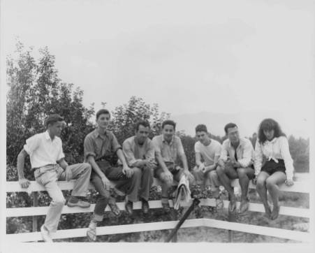 Group photo taken at the entrance to the Studies Building (?), Lake Eden Campus, Black Mountain College, Summer 1946. From left to right: Kendall Cox, Theodore "Quintus" Dreier, Jr., Bob Murphy, Peter Oberlander, unidentified person, Nick Muzenic, and Barbara Stein. Courtesy of Western Regional Archives.