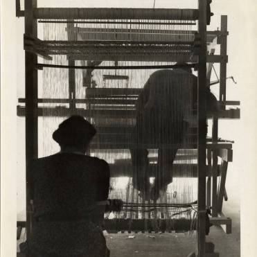 Two weavers with rug loom, ca. 1940. Photographer: John Stix. Courtesy of Western Regional Archives.